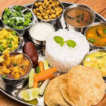 टमाटर और एलपीजी की बढ़ती कीमतें, क्या रसोई का बजट बिगाड़ रही हैं? रिपोर्ट में ये दावा